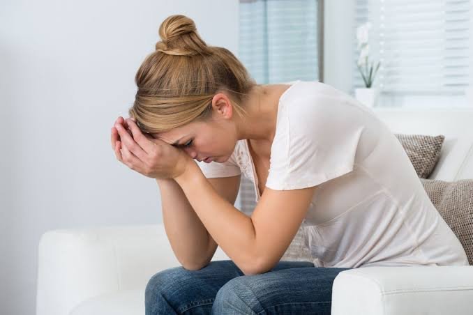 Person sitting quietly at home